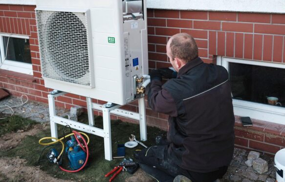 Installing a heat pump in a single-family house, December 2021.