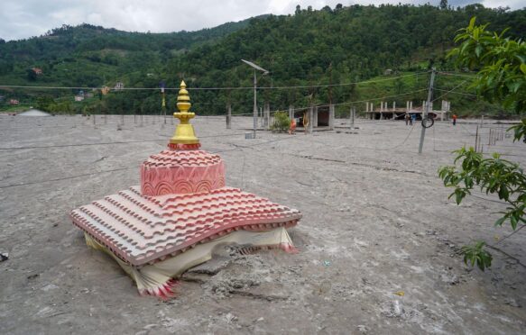 The remains of a flooded temple in Melamchi, Nepal on June 18, 2021.