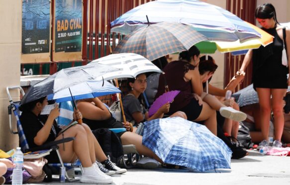 People take shelter from the heat in Spain, on 12 July 2023.