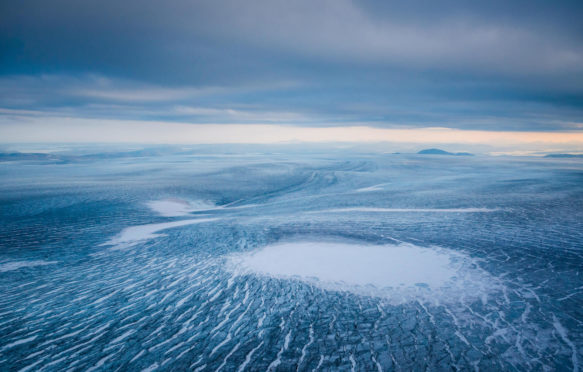 Aerial view of the ice sheet, Greenland. Credit: imageBROKER / Alamy Stock Photo.