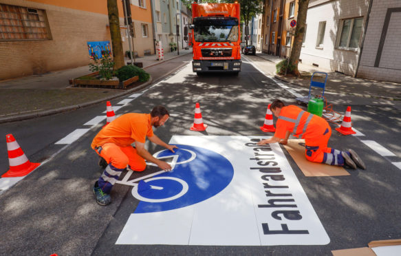 Application of new bicycle pictograms. Essen, Germany.
