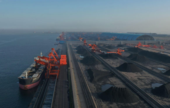 Bulk carrier loading cargoes at a newly built coal berth of Caofeidian Port in Tangshan, north China's Hebei Province.