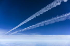 Mid-air view of et contrails in the sky
