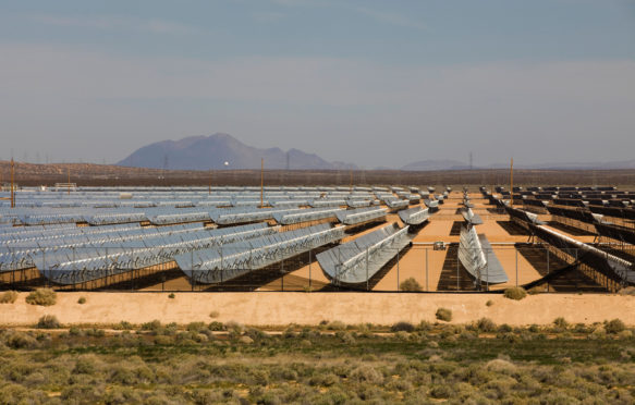 An array of solar troughs in the North American southwest desert - California, USA