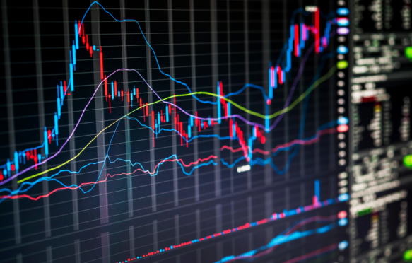 Stock market charts displayed on trading screen of online investing platform Credit: Elena Elisseeva / Alamy Stock Photo